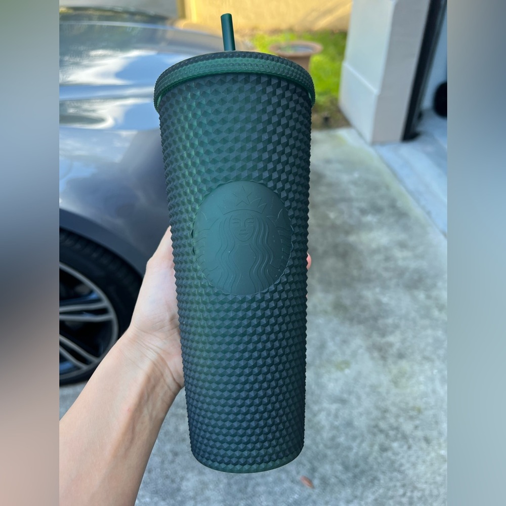 Studded army green venti Starbucks tumbler. With straw